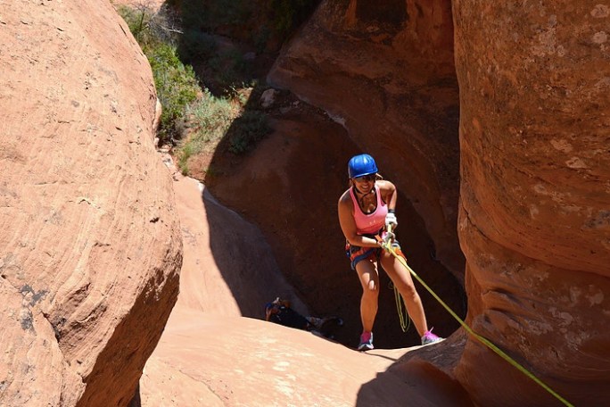 a man sitting on a rock